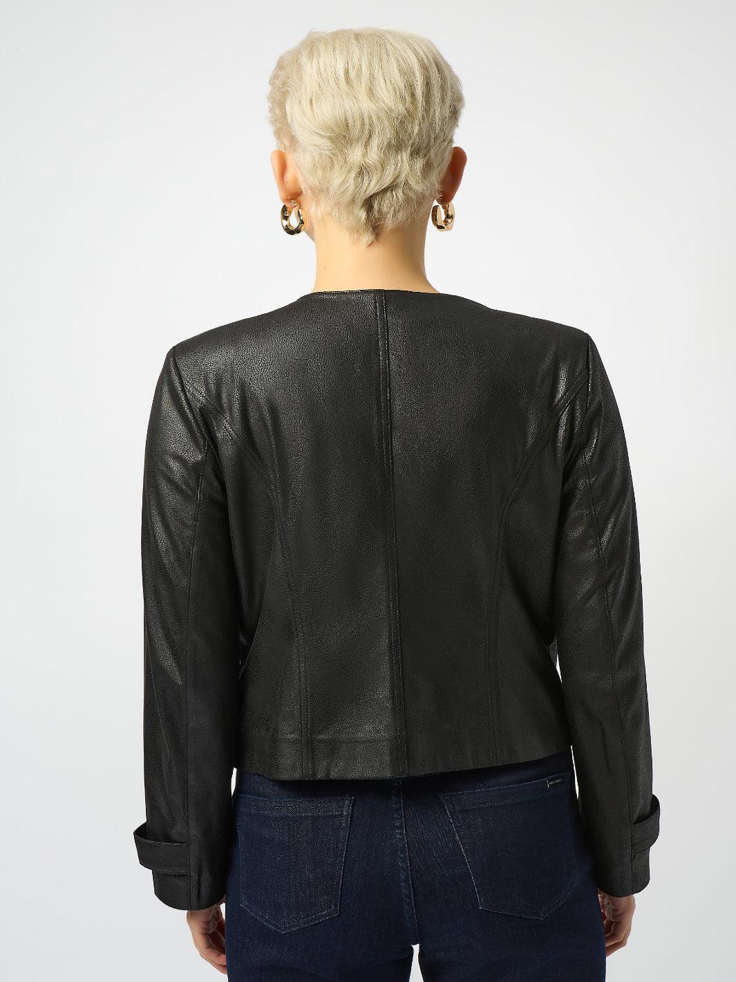 Person wearing a black leather jacket from behind on a white background