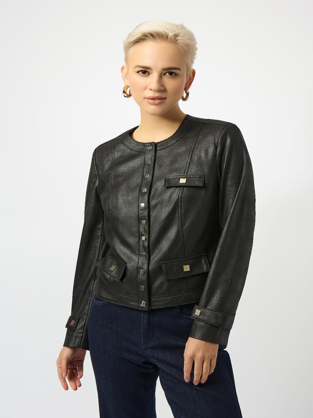 Woman wearing a black leather jacket on a white background