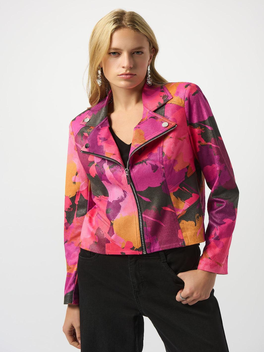 Woman wearing a colorful jacket with a white background