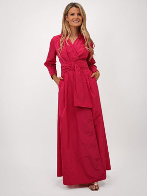 Woman wearing a long red dress on a white background