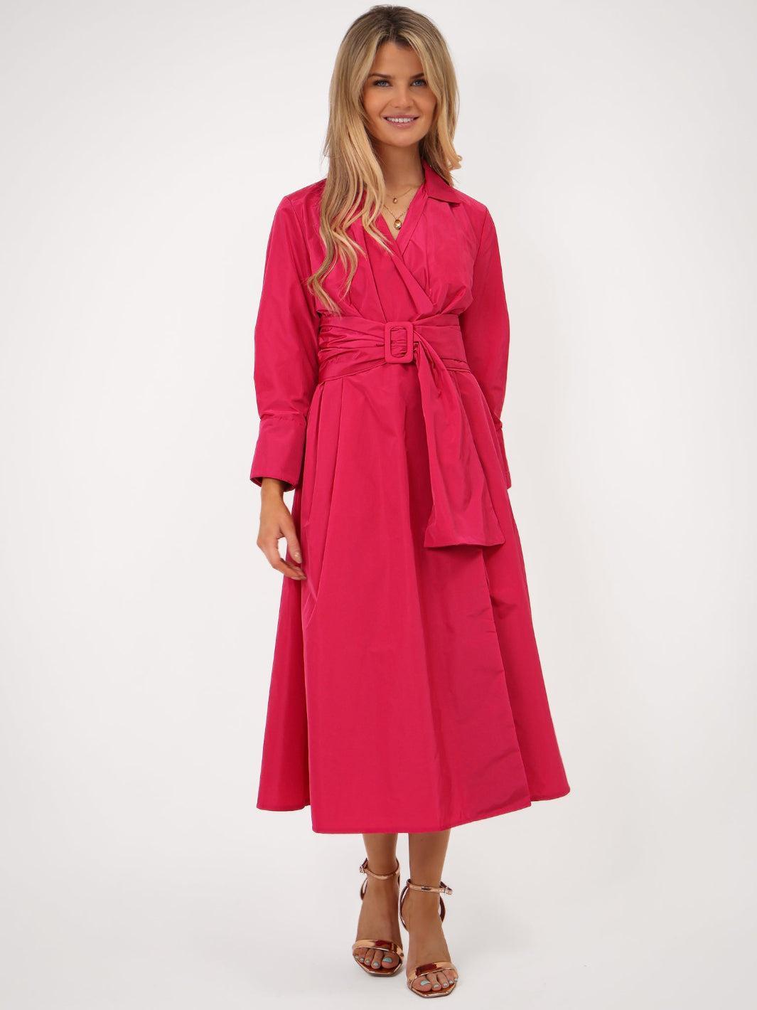 Woman wearing a pink trench coat on a white background